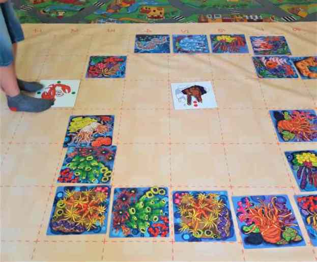 Klucz do programowania dla dzieci - gra dywanowa wśród rafy koralowej.